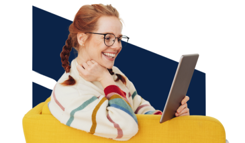 A young woman reading on a tablet device