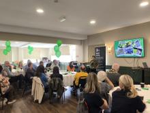 Room overview of Helen Tomlinson speaking at the Bury VCFA Grants Event
