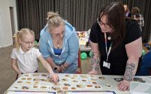 Picture of young person and mum co-design the Live Well Cafe Menu