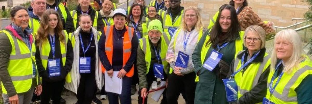 A group of volunteers for the Bury 10k smiling together