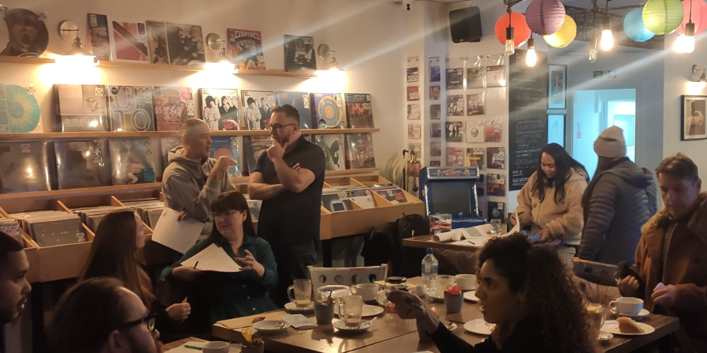 A group of people in a community space networking