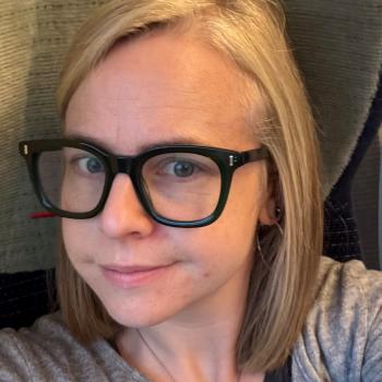 Image of selfie with a women smiling into the camera